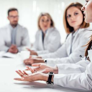 Physician at a table