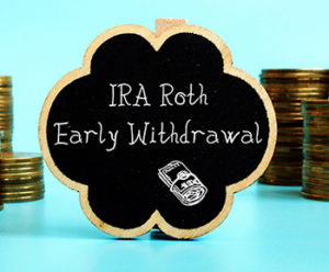 IRA Roth Early Withdrawal written on chalk board with stacks of coins around it
