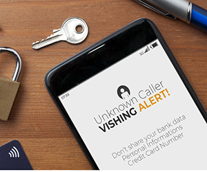 Vishing Alert on Cell Phone with a Lock, Key and Credit Card Surrounding the Phone