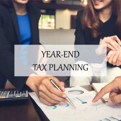 Advisor with client for year-end tax planning