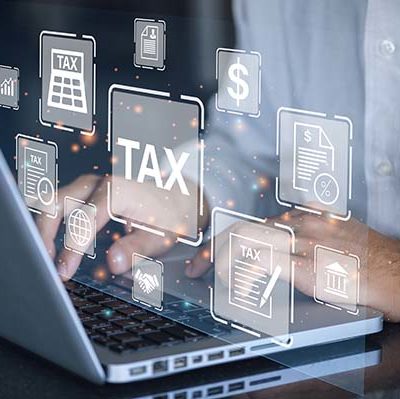 Busines using a computer to complete Individual income tax return form online for tax payment. Government, state taxes. Data analysis, paperwork, financial research, report. Calculation tax return.