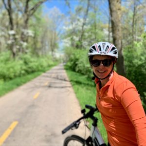 MaryBeth Meyer riding a bicycle